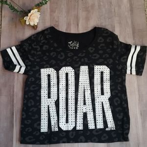 Shirt with silver and white writing